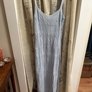 Beach/pool side cover up. Very flattering, neutral light blue color. NWT